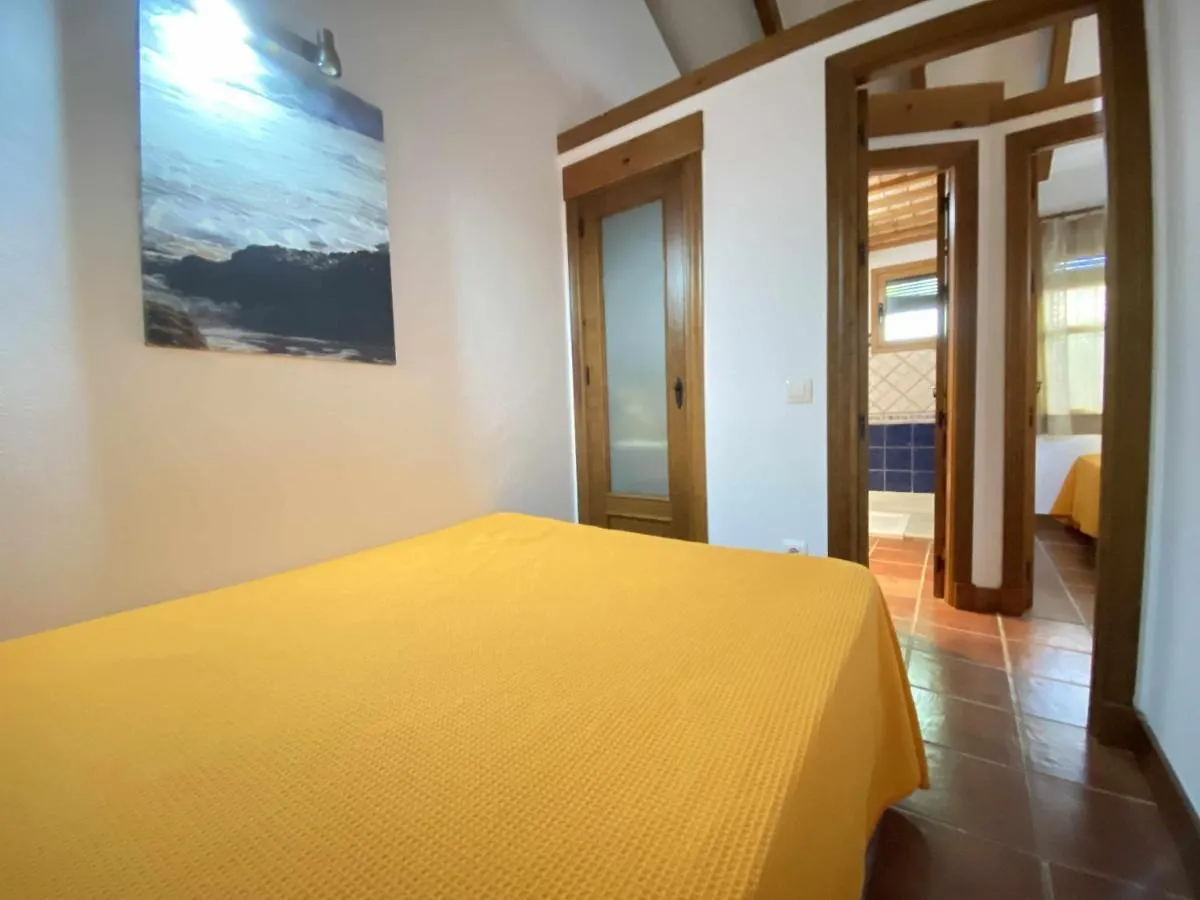Casa de Férias Casa Bungalows con jardín privado y piscina compartida en playa el Palmar Cádis